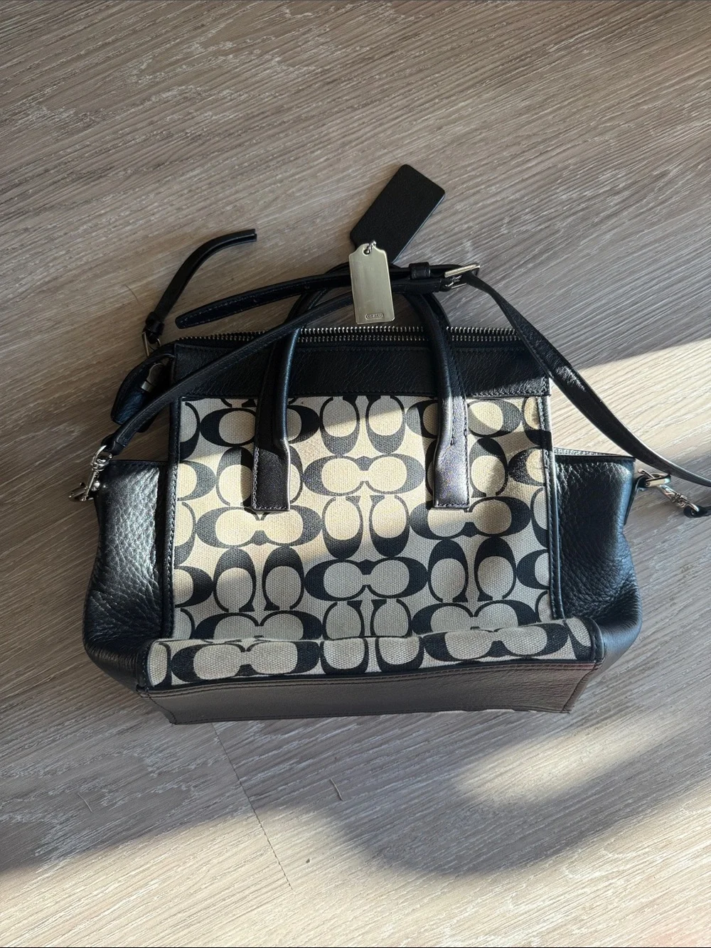 Coach satchel signature